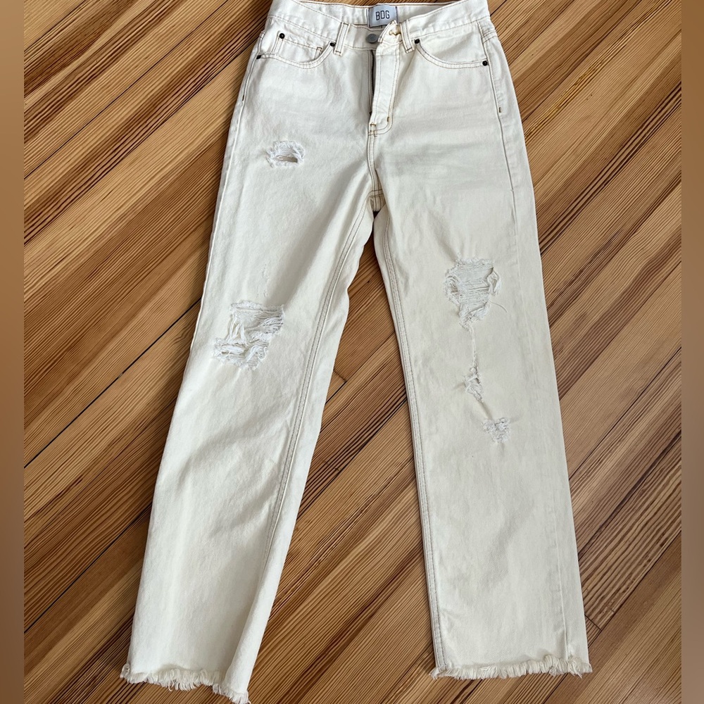 urban outfitters distressed cream cowboy jean